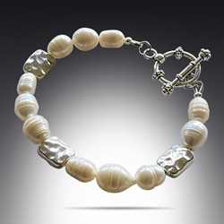 Freshwater Pearl Bracelet with Silver Pewter rectangle beads and toggle clasp. You can find this bracelet in my Freshwater Pearl Collection at creativejewelrybymarcia.com