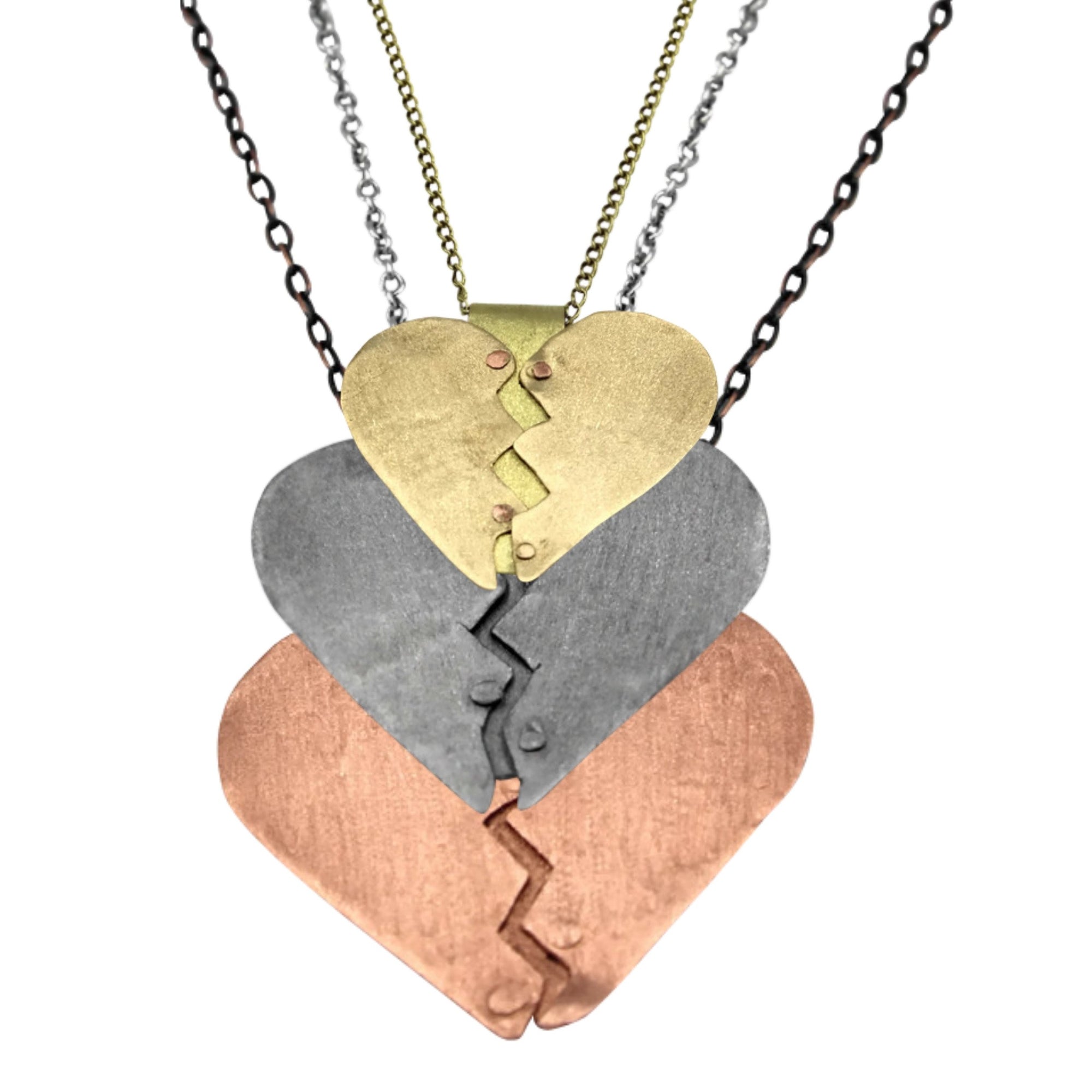 These are my healing heart necklaces. There is a gold heart necklace, silver heart necklace and a copper heart pendant necklace. I made these healing hearts in honor of the survivors and those that didn't from Domestic Violence.