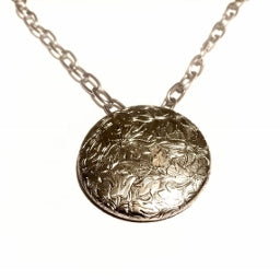 This silver pendant necklace is made using stainless steel chain. The silver pendant was from an antique earring.