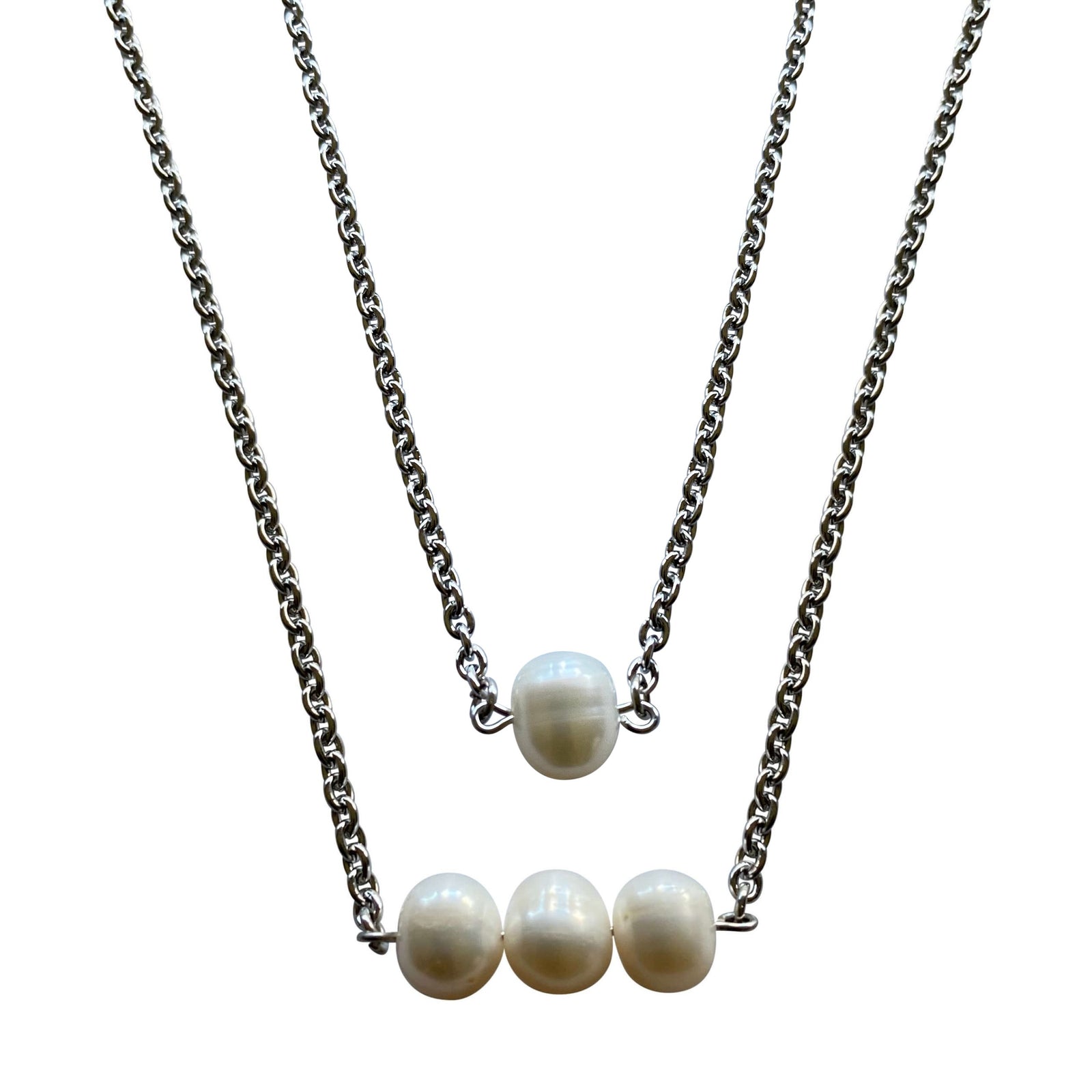 Freshwater Pearl Necklace with stainless steel chain and matching silver and freshwater pearl Earrings. These are part of my Freshwater Pearls at Creativejewelrybymarcia.com