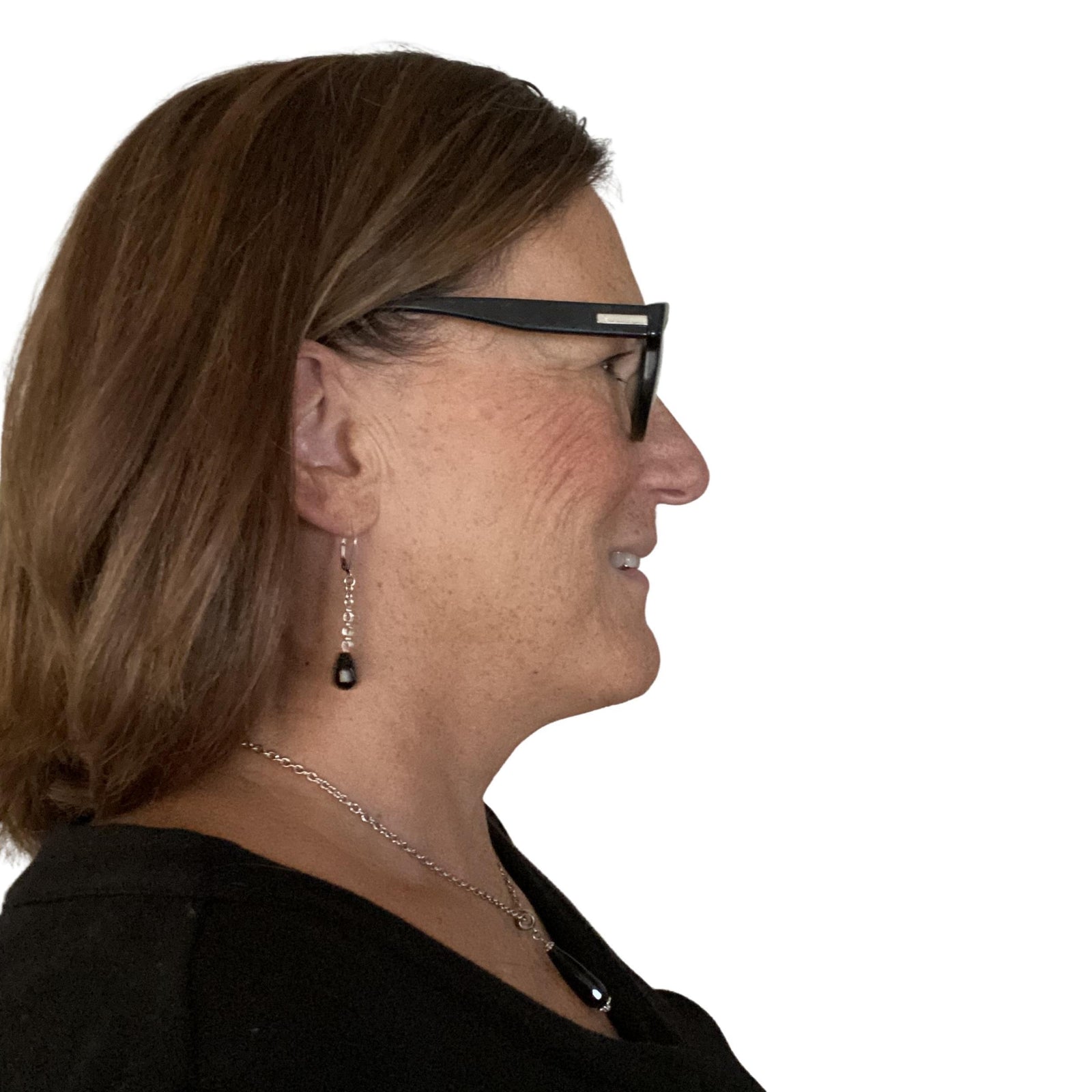 This is a photo for Womens Earrings. Photo of me, headshot showing Silver Earrings that are leverback earrings from my Silver Lining Collection at Creativejewelrybymarcia.com